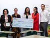Harmony Yan-Li poses with her $6,000 grand prize check. 