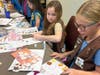  Girls rotated through interactive stations designed to reinforce goal setting, practice their cookie pitch, learn safety and money management skills, and celebrate the start of the season through games, activities, and cookie tastings.