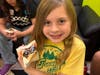  Girls rotated through interactive stations designed to reinforce goal setting, practice their cookie pitch, learn safety and money management skills, and celebrate the start of the season through games, activities, and cookie tastings.