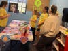  Girls rotated through interactive stations designed to reinforce goal setting, practice their cookie pitch, learn safety and money management skills, and celebrate the start of the season through games, activities, and cookie tastings.