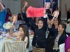 Family members of Dr. Stacy Zarakiotis-Alexandrou, a pediatric dentist in Greenwich and with Greenwich Hospital who won the People’s Choice award for the most funds raised, cheer her on at Dancing Stars of Greenwich.