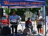 The PanNeubean Steel Trio performing at the 2024 Woburn Juneteenth event.