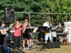 One Moe Time, a 7-piece party band, performed at Ice House Park on Horn Pond on Friday, July 19. 
