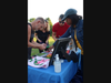 Visitors of the SCI table looked through CDs collected from bands who performed at the SCI Summer Concerts since 2004. 
