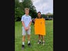 SCI LET Volunteer, Mason Kalman, posed with the SCI Social Connection Bingo winner, Xianna Russel.