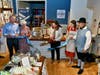 HBMS President & CEO LoriAnn Wukitsch cuts the ribbon in honor of the Schropp Dry Goods Shoppe's grand opening on Thursday, May 23.