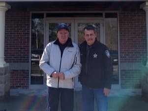 Bruce Breton and Rockingham County Sheriff Chuck Massahos.