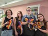 Rodier Flowers' team crafted 62 festive bows which adorn trees on Main Street in honor of Pride month.  (From L to R) Janene Starr, Gabrielle Rowe, Kiera Sleigh, Hannah Caudill,
Eden O'Malley * (not pictured*)
