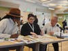 Gateway Alumni Will Pender, Christina Scilla-Rivera and Joseph Thomas evaluated students' designs and pitches to choose new Alumni Network logo. 
