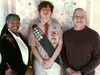 Reverend Shea Maultsby, Minister at Unity of Sussex County; Aiden Arias, Eagle Scout; and Mark Correal, President at Unity of Sussex County 