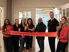 Ridge Crest nursing and rehabilitation staff cut the ribbon on the new rehabilitation gym