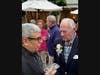 WWII veteran Bob Wylie, who turns 100 in the spring, speaks with a reporter at a party to honor him and 11 other current or soon to be centenarians at Meadow Ridge.