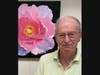 Ed MacEwan with one of his watercolor paintings.