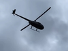 Helicopter carrying the Easter Bunny over Houston's Northgate Country Club.