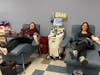 Twins Linda Markese and Laura Diaz give platelets side by side in memory of their brother, Eric Oleksy—honoring his life by helping others. 