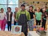 Girl Scouts and Chef Roberto Cooking Through Culture