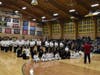 Competitors assemble at the Independent Martial Arts School Tournament, held Saturday, April 6, at Bishop Guertin High School.  Opening ceremonies included the awarding of the Craig P. Hutchinson Memorial Scholarship.  