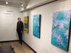 Borchert by her artwork at Vika Gallery