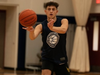 Fasman Yeshiva's Yoni Silberstein dishes to a teammate.  
