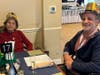 Residents sport celebratory New Year’s attire while enjoying the festivities.