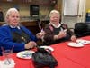 Residents showcase their artistic talents while painting beautiful butterfly pottery during a creative and colorful session with The Spotted Canvas.