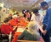 Members of Phi Theta Kappa Honor Society from Bergen Community College spend Valentine's Day with residents, crafting handmade bracelets and heartfelt cards together.