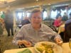 Resident enjoys the delicious spread created by the talented culinary team! 