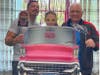Attendees smile with photo props! 