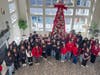 Juniper residents, students from Delcastle Technical High School, and community partners gather for a group photo during the Second Annual Bridging Generations: A Day of Service, celebrating a successful day of intergenerational collaboration and service.