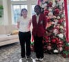 Two Delcastle Technical High School student volunteers participate in Bridging Generations: A Day of Service at The Vero at Newark, working alongside residents to support local community organizations.
