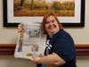 Rachel brings a cheerful presence to Juniper Village at Mount Joy while delivering newspapers to residents each week.