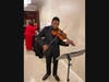 Young Violinist, Aiden Jordan, greeted guests as they entered with beautiful Classical Music.