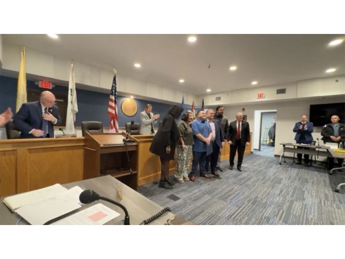 Councilwoman Rogers with Canzona, his parents, Coach Kiningham and Mayor Kane.
