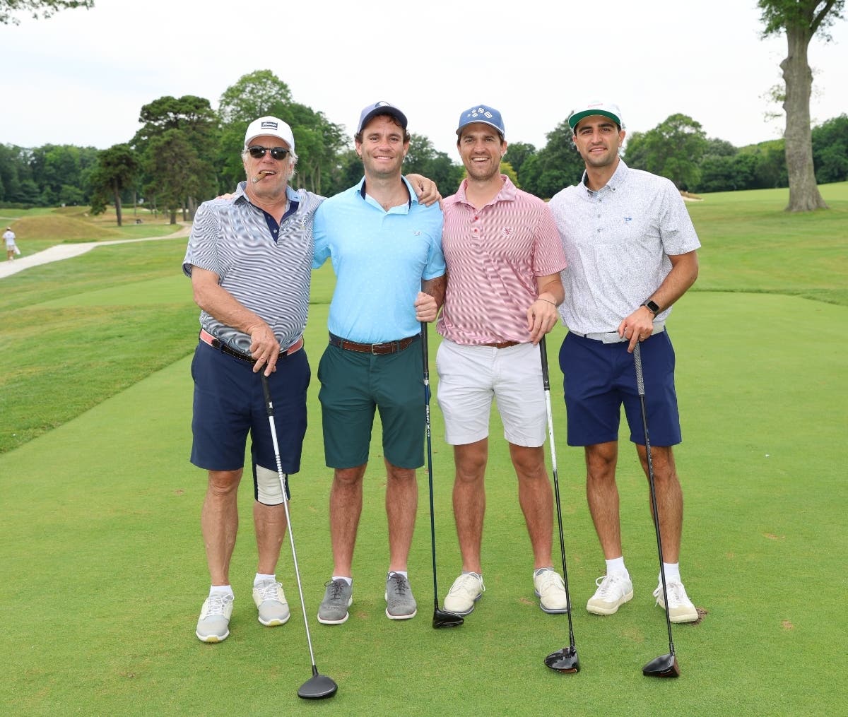 L to R: Bill Luby, Frank Luby, Jack Luby, and Jackson Reid enjoying the course.