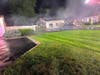 Firefighters responding to the house fire.