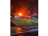 The fire burning at the home.