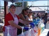 Volunteers serving snow cones.