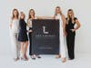 The LEV Lounge team with a coming soon sign for Fair Haven.