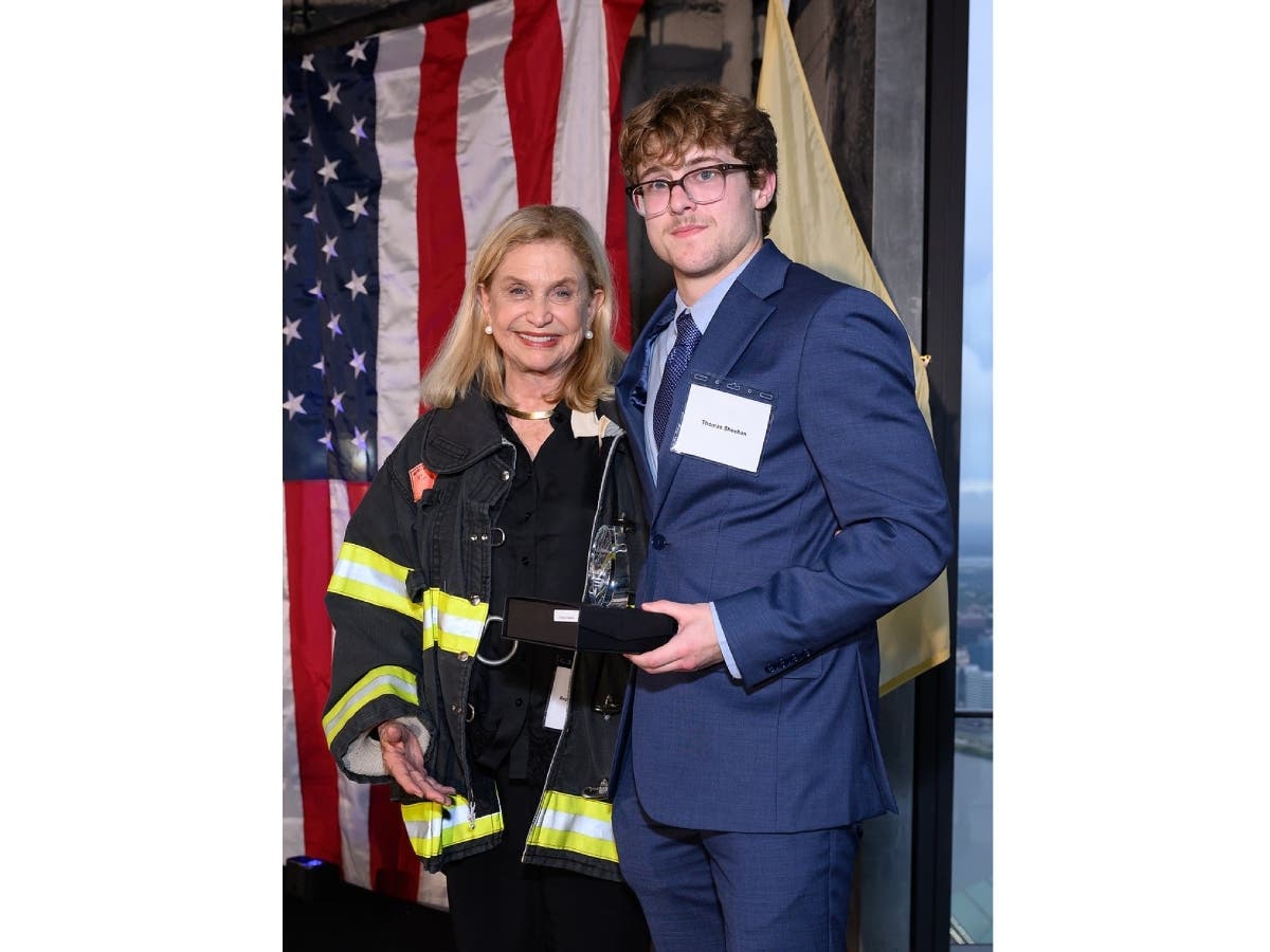 Former Manhattan Congresswoman Carolyn Maloney with scholarship winner Thomas Sheehan.