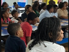 Parents and children engage in a Parent University workshop at Marion P. Thomas Charter School