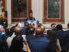 CT State Asnuntuck student Kris Louis reading a letter from President Joe Biden at the White House. Kris served as an intern there this past semester. 