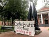 Activists from a group called Loudoun 350 covered the statue in 2018 for about 15 minutes while protesting its legacy with signs that said, "Confederate statue = hate."
