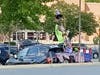 Sanders is seen at the Target Shopping Center in Leesburg Sept. 20 decorating his vehicle and hanging material on poles in the shopping center, which included mannequin parts.