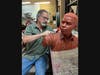 Artist Jeff Hall working on the "Upward Struggle" statue at Frederick Douglass High School in Leesburg.