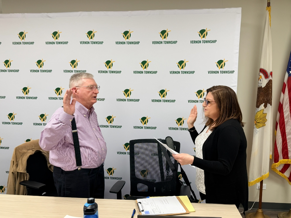 Township resident George Yeager being sworn in as moderator for the meeting.