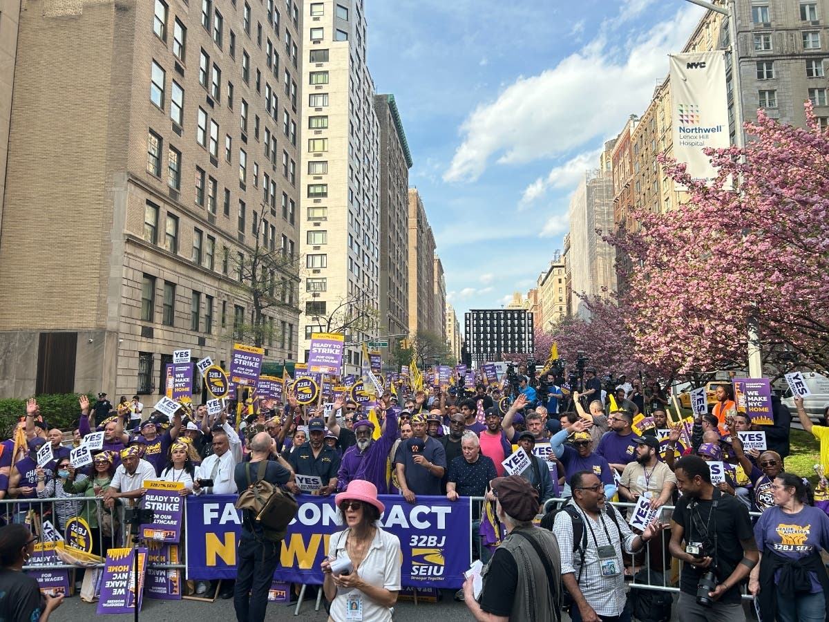 Thousands of unionized doormen and building workers marched on Park Avenue from 79th Street to 83rd Street on Wednesday after voting to authorize a strike. 