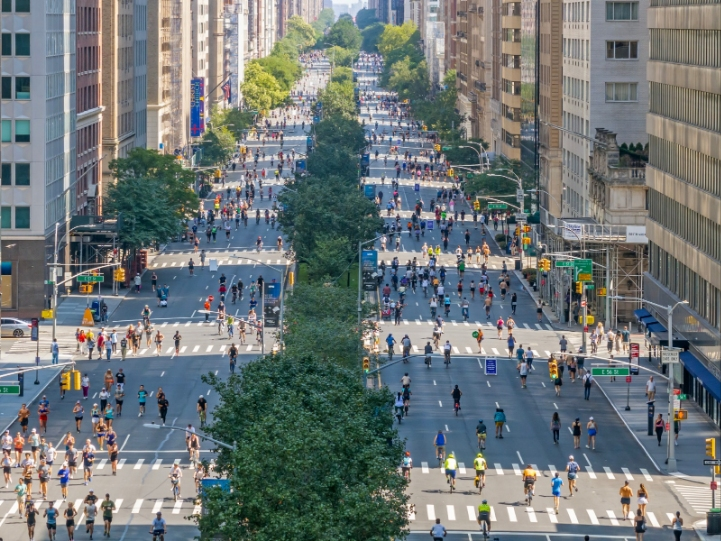 New Yorkers walk and bike along Park Avenue during Summer Streets in 2025.