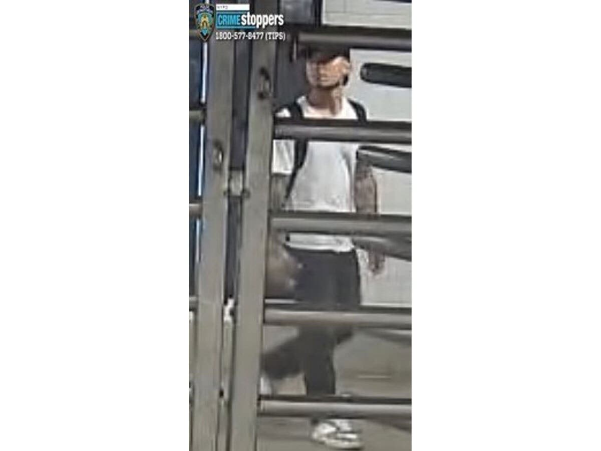 The 27-year-old woman was walking down a stairwell at the Fifth Avenue-59th Street station around 2:10 p.m. when the man approached her from behind, police said.