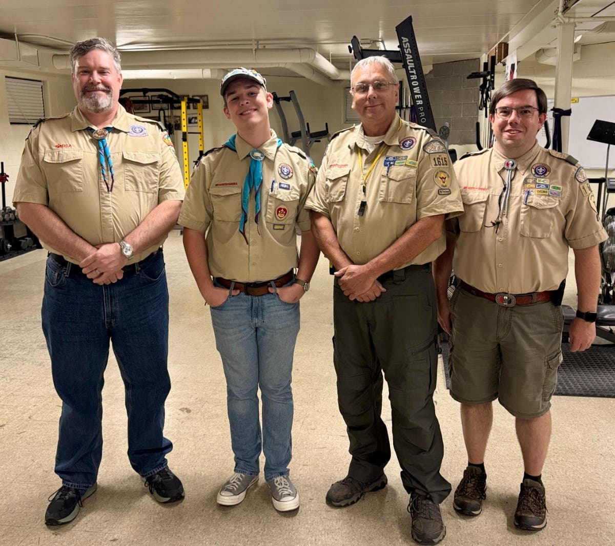 Eagle Scout Xander Frink (second from left) with members of his troop committee.