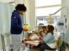Chicago Bears defensive lineman Daniel Hardy meets with patients on Tuesday, October 29, 2024, at Advocate Sherman Hospital in Elgin, Illinois. Hardy talked with patients and gave them a Lemons of Love box to help them through their care.